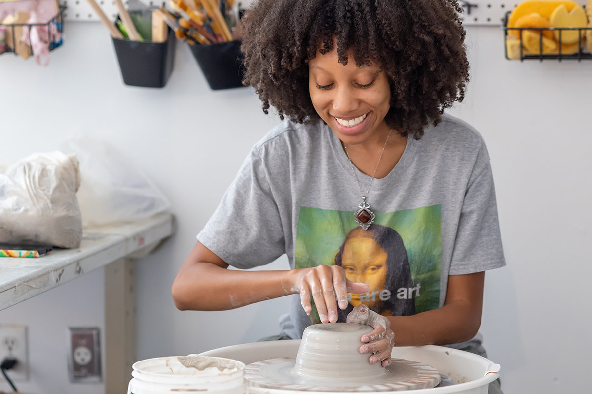 A resident artist at work in a studio at Houston Center for Contemporary Craft